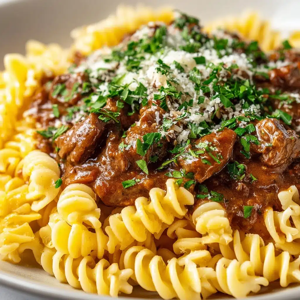 Slow Cooker Creamy Garlic Beef Pasta Recipe - Recipe Image
